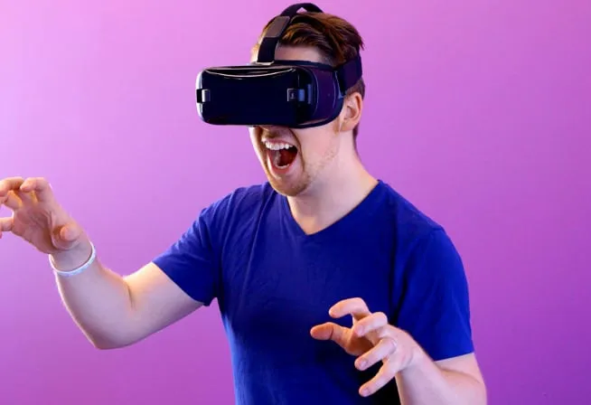Person wearing a VR headset experiencing immersive virtual reality